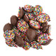 Ashers Milk Chocolate Nonpareils with bright multi-color seeds, delicious dollops, approximately 91 pieces per pound.