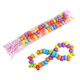 Individually wrapped KoKos Candy Necklaces, vibrant assorted colors, approx. 25 per pound, fun novelty candy.