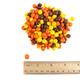 Mini Reese's Pieces candy, mixed yellow, brown, orange, crunchy peanut butter shells for snacking, baking, dessert toppings.