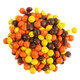 Mini Reese's Pieces. Yellow, brown, orange, crunchy shell peanut butter candies for snacking, baking, Halloween.