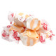 Pastel Peaches 'n Cream Salt Water Taffy, approximately 65 pieces, orange and cream colors. Made in USA.
