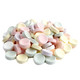 Piles of unwrapped Bulk Smarties candy, vibrant rainbow colors, approx 900 pieces per pound, ideal for candy buffets.