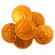 Bright orange foil-wrapped milk chocolate coins, approximately 80 per pound, with a US half dollar design.