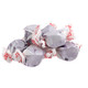 Vibrant purple Salt Water Taffy Grape, approximately 65 chewy pieces per pound. Sweet, gluten-free, USA made candy.