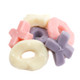 Gummy Hugs and Kisses XO, Valentine's Day candy. Assorted purple, yellow, red grape, pineapple, strawberry gummies.