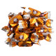 Light brown Coffee Rio Caffe Latte hard candies, real coffee flavor. A pile of approximately 87 individual candies.