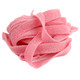Vibrant pink lemonade sour belts, 9-inch long tangy candy strips coated in sour sugar, approx. 50 per pound bulk.