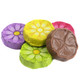 Madelaine milk chocolate gerbera daisy flowers, wrapped in bright foils, approx 50 per pound, Made in USA.