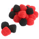A close-up of a red and black gummy berry candy coated in nonpareil sprinkles.