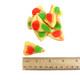 Sweet gummy pizza slices, bite-size, with red, green, and white toppings. Approx. 68 pieces per pound.