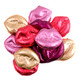 Miniature chocolate lips, assorted, in bright pink, gold, purple foils. Approx 60 per pound, Valentines candy.