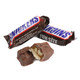 Pile of individually wrapped Snickers Fun Size candy bars, brown & blue, milk chocolate, golden caramel, nougat, peanuts.