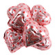 Pink, foil-wrapped chocolate fudge hearts, heart-shaped, creamy fudge filling, approx 45 hearts per pound.
