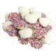 White chocolate discs topped with a rainbow of bright nonpareils, bulk unwrapped candy, approx 130 per pound.