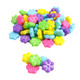 Sweet, tart, pressed candy flowers in 5 vibrant colors, approx 340 per pound, perfect for Easter & desserts.