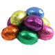 Vibrant jewel-tone foil wrapped dark chocolate Easter eggs, approx 63 per lb, Madelaine Chocolate, USA.