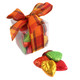 Madelaine solid chocolate Fall leaves gift box with a festive bow.