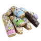 Around 50 dark chocolate Easter bunnies, individually wrapped in assorted colorful foils, solid premium candy.