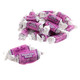 Bite-sized Valentine Tootsie Roll Midgees, approx 65 per pound, in pink and purple wrappers with sweet sayings.