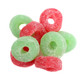 Red and Green Jelly Christmas Wreaths, sugar-coated cherry and lime flavored, festive candy for holidays.