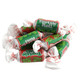 Christmas Tootsie Rolls Midgees, individually wrapped in festive holiday wrappers, rich chocolate flavor, approx. 70 pieces per pound.