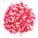Close-up of vibrant red, pink, white Valentines Sprinkle Mix. Festive Jimmies for baking, cookies, and desserts.