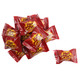 Vibrant red Hot Zotz hard candies, individually wrapped. Spicy cinnamon flavor with a fizzy center, 90 per pound.