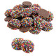 Pure milk chocolate nonpareils, generously covered on one side with vibrant rainbow sprinkles, approx. 130 pieces per pound.