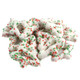 Christmas tree-shaped pretzels, white yogurt coated with red and green sugar sprinkles, festive holiday treat.