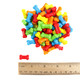 Rainbow-hued pressed candy bones, tiny and tart. Approximately 375 multi-colored Halloween candy bones per pound.
