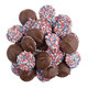 Patriotic milk chocolate nonpareil discs, topped with vibrant red, white, and blue sprinkles. Approximately 130 pieces per pound.
