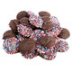 Patriotic milk chocolate nonpareils, red, white, blue candy discs, creamy, smooth.