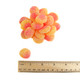Bright orange Sour Patch Kids Peaches gummy candy, coated in sour crystals. Tangy peach flavor, approximately 98 per pound.