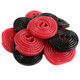 Red and black licorice wheels by Gerrit Verburg, approx. 45 per pound, each 1.5 inch diameter.