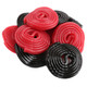 Red and black licorice wheels, rolled, 1.5-inch diameter. Gerrit Verburg candy, approx 45 per pound.