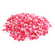 Adorable mini heart sprinkles in red, white, and pink, perfect for Valentine's Day cupcakes, desserts, and baking.