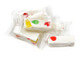 Individually wrapped Jujube Nougat Candy, with orange, lime, cherry, and lemon fruity jelly jubes, soft, fluffy texture.