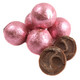 Pile of bright pink foil wrapped double chocolate balls, rich Palmer chocolate candy, approx 35 pieces per pound.