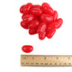 Vibrant red, jumbo cinnamon jelly beans, approx. 80 per pound. Large, spicy, chewy candy for a fiery kick.