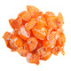 Brilliant orange Napoleon Sour Orange Bon Bons, individually wrapped hard candy, approx. 65 pieces per pound.