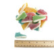 Assorted sour gummy sneakers with white bottoms, pineapple, strawberry, tangerine, green apple, raspberry, grape flavors.