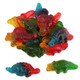 Gummy Dinosaurs, red, green, yellow. Chewy fruity candy in brontosaurus, stegosaurus, triceratops shapes. Approx 70 pieces.