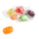 Assorted colorful hard candy barrels, red cherry, orange, green apple, purple grape. Classic fruity FlavorPops.