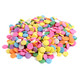 Large pastel confetti sprinkles, a colorful mix of pink, orange, yellow, green, blue, purple, white. Dessert toppings.