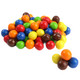 Vibrant rainbow Sixlets, bite-sized chocolate candies with crisp shells, ideal for candy buffets and party favors.