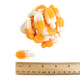 Many orange and white mini gummy popsicles, soft, chewy, orange cream vanilla flavored candy.