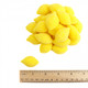 Vibrant yellow gummy lemons, classic lemon shape, soft chew, sweet citrus flavor, shimmering with sanding sugar.