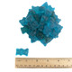 Spicy blue raspberry gummy bears, vibrant blue, soft chewy texture, fiery flavor, small bear shapes.