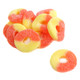 Pile of orange and yellow sour gummy Peach Rings, about 60 rings per pound.