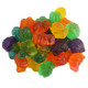 A pile of bulk colorful Albanese On Vacay beach-shaped gummy candies.
